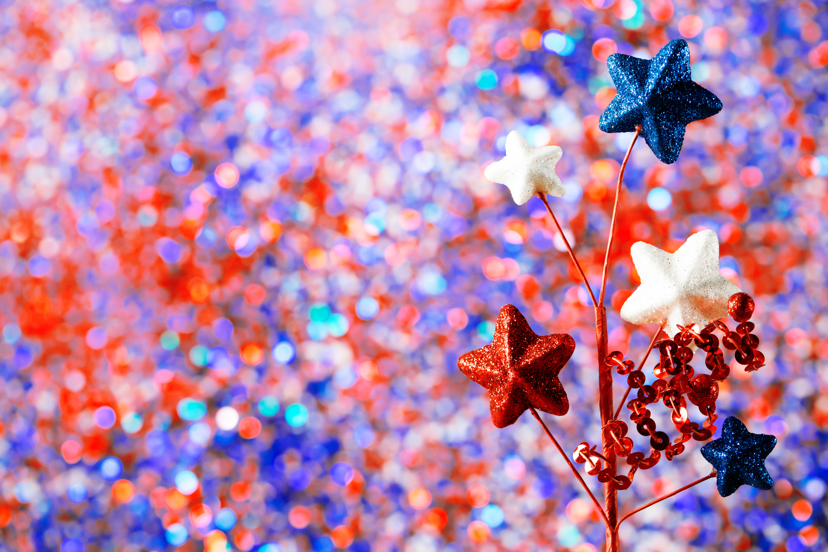 4th of July decorations on sparkling background